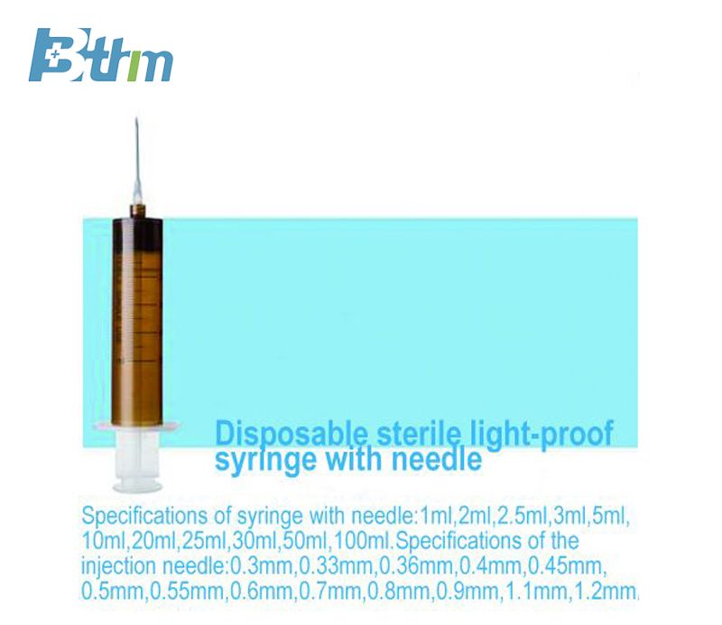 Disposable sterile light-proof syringe with needle